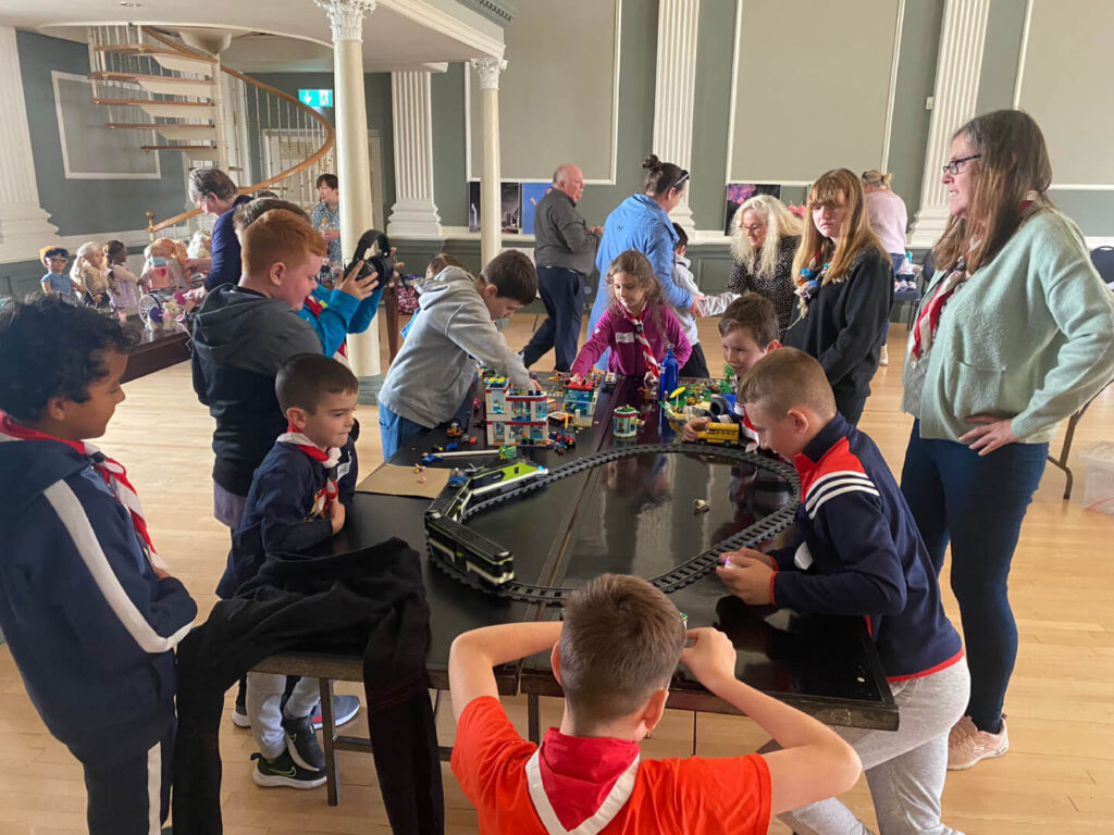 A group of children playing with toys .
